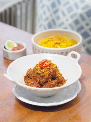  Rendang! Keşfedilmemiş Bir Lezzet Yolculuğuna Çıkın: Küçük Parçalar Halinde Pişirmeye Uygun Yumuşak, Kremsi bir Sığır Eti